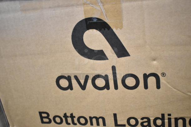 Brand new Avalon A14 bottom loading water cooler box, labeled "scratch and dent," stock image.