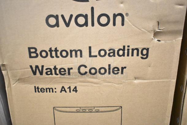 Box containing Avalon A14 bottom loading water cooler, showing brand and model. Box has minor scratches or dents.