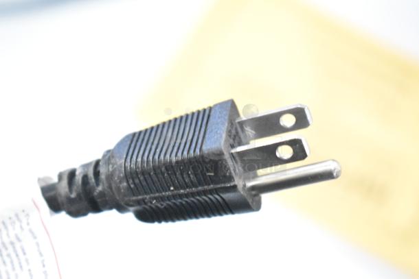 Power plug for an Avalon A5BLK water cooler dispenser, stock image, indicating potential setup requirements.