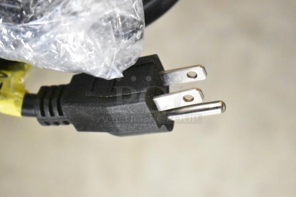 Close-up of a power plug for the Arctic Air ACP63 refrigerated prep station, showing protective plastic wrap.