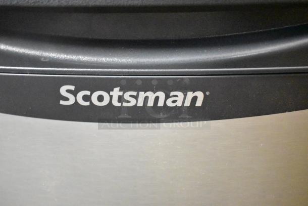 Scotsman logo on new Scotsman UN0815AX-1A undercounter nugget ice machine, 36 lb. bin, 115V, 1-phase.