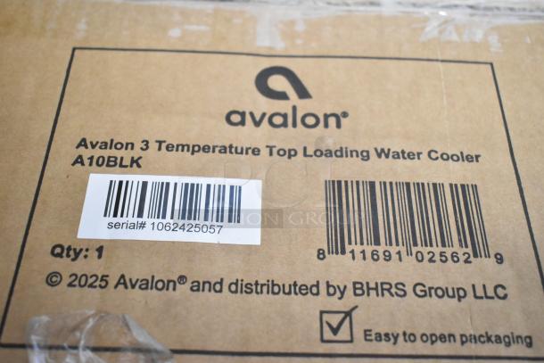Box displaying the Avalon A10BLK bottom-loading water cooler label, featuring serial number 1062425057.