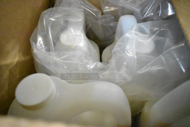 Box of assorted cleaning supplies, including Diversey Crew Toilet Bowl Cleaner and Biotech Multi Surface Cleaner, wrapped in plastic.