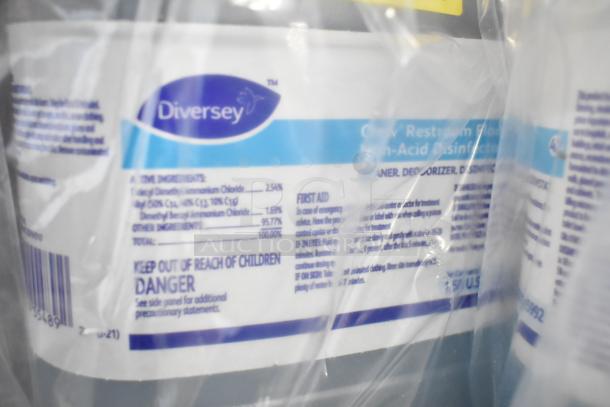 Two Tier Lot including Diversey cleaner, desk calendars, Lysol cleaner, wire glove box holder, Purell soap, Coastwide soap.