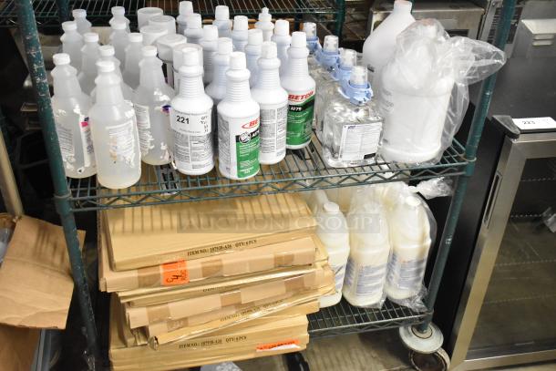 Two-tier lot with Betco AF79 Cleaner, Coastwide Disinfectant, Purell Hand Sanitizer Foam, Briotech Sanitizer. Various conditions.