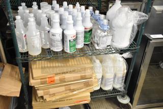 Two-tier lot with Betco AF79 Cleaner, Coastwide Disinfectant, Purell Hand Sanitizer Foam, Briotech Sanitizer. Various conditions.
