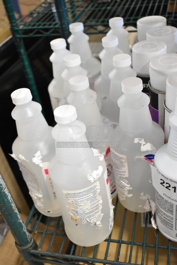 Two-tier lot with various cleaning products: Betco AF79, Coastwide Disinfectant, Purell Sanitizer, Briotech Sanitizer. Labels visible.