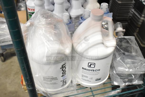 Two-tier lot of cleaning supplies, including Betco AF79 Cleaner, Coastwide Disinfectant, Purell Foam, Briotech Sanitizer.