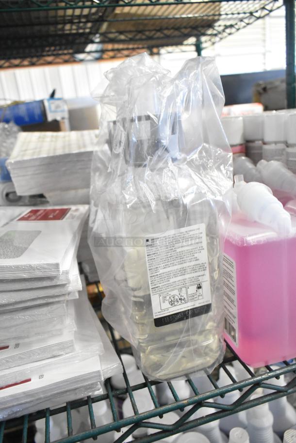 Two-tier lot including 1099 envelopes, hand sanitizer, Scott Foam Skin Cleanser, and Claire Disinfectant Spray on metal shelves.