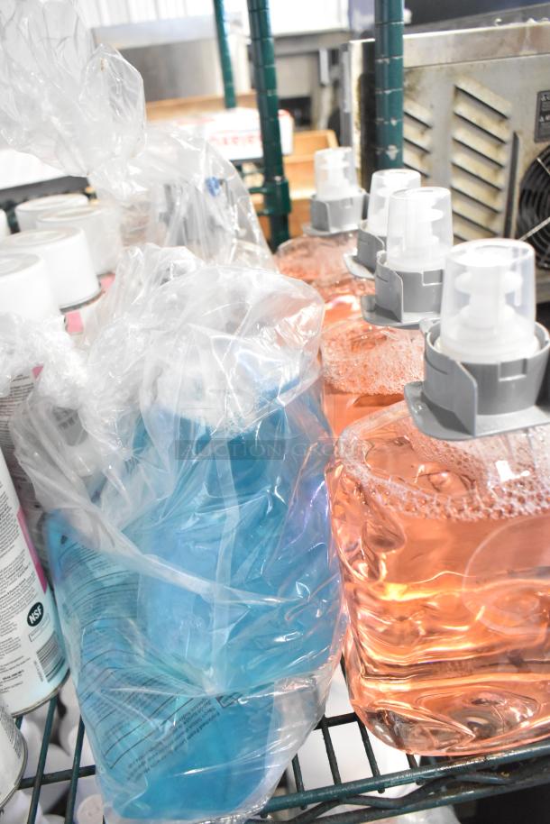 Two-tier lot including 1099 envelopes, hand sanitizer, Scott Foam Skin Cleanser, and Claire disinfectant spray.