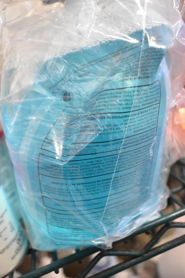 Two-tier lot with 1099 envelopes, hand sanitizer, Scott Foam Skin Cleanser, Claire Disinfectant Spray in mixed condition.