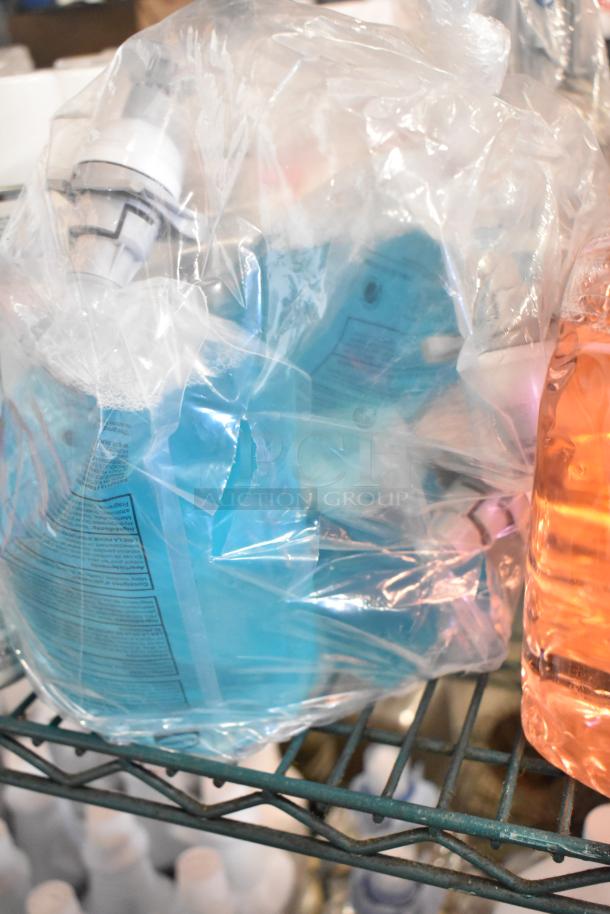 Two-tier lot with various items including 1099 envelopes, hand sanitizer, Scott Foam Skin Cleanser, Claire Disinfectant Spray.