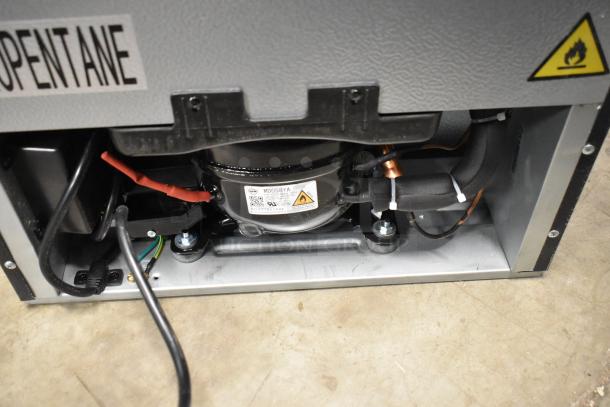 Brand new Honeywell H115BCS can cooler compressor detail, 115 volts, 1 phase, with "PENTANE" label visible.