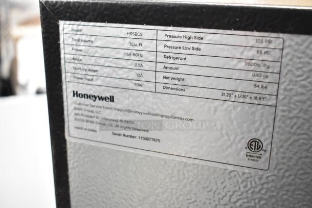 Honeywell H115BCS cooler tag, 115V, 3 cu. ft., 105 PSI high, 55 PSI low, R600a refrigerant, 54 lbs, dimensions: 31.29" x 17.51" x 18.89".