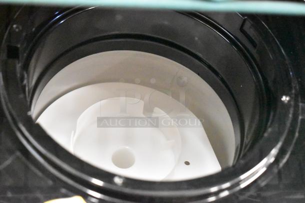 Avalon A11BLK Top Loading Countertop Water Cooler, 115 Volts, 1 Phase, black exterior, top interior view.