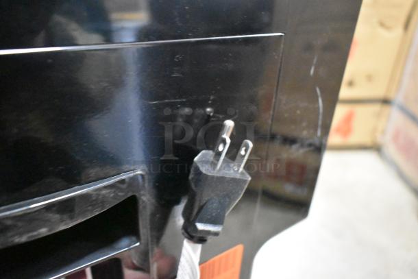 Avalon A11BLK Top Loading Countertop Water Cooler, 115V, black, shows standard plug, minor surface scratches visible.