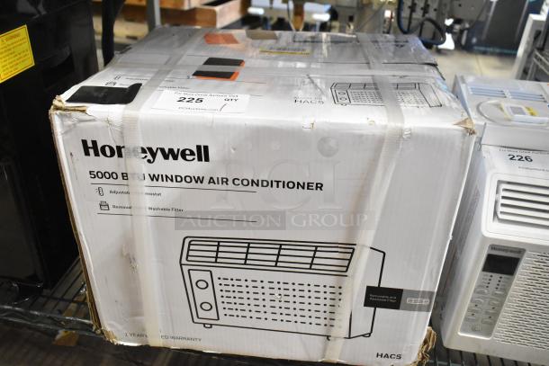 Alt text: Honeywell HAC5 5,000 BTU window air conditioner boxed, brand new scratch and dent condition, adjustable thermostat.