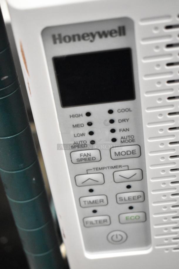 BRAND NEW SCRATCH AND DENT Honeywell HAC6 6,000 BTU window AC, 115V. Controls: high/med/low fan, mode, timer.