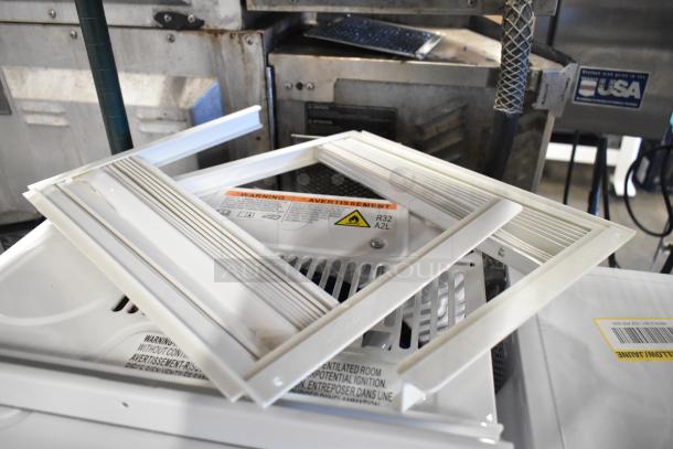 BRAND NEW SCRATCH AND DENT Honeywell HAC6, 6,000 BTU window AC unit, 115V, labels show R32 refrigerant warning.