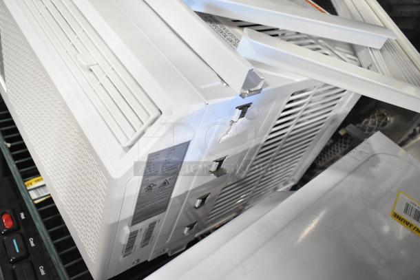 BRAND NEW Honeywell HAC6, 6,000 BTU window AC, 115V. Minor scratches; labels visible. Energy-efficient cooling.