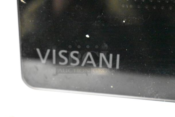 BRAND NEW SCRATCH AND DENT Vissani EM720C2KHWCL 0.7 cu. ft. 700-Watt Countertop Microwave label close-up.
