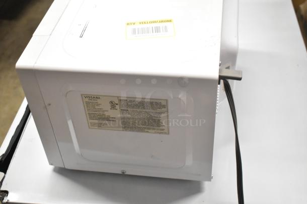 Brand new Vissani EM720C2KHWCL 0.7 cu. ft. microwave, 700-Watt, 115 Volts, 1 Phase. Scratch and dent condition. Visible labeling.