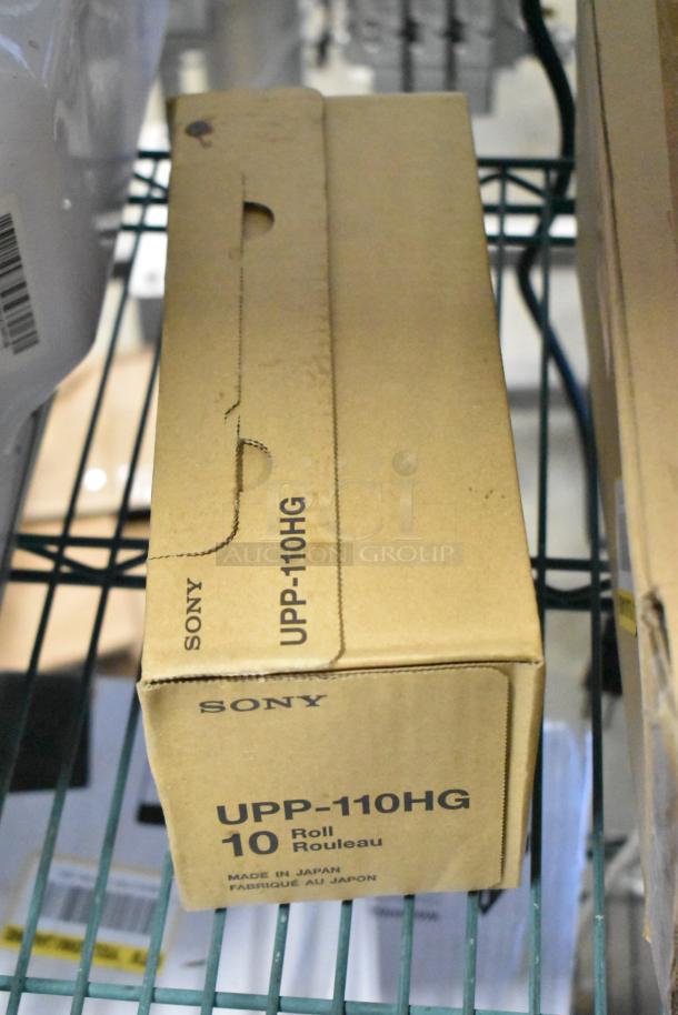 Box of Sony UPP-110HG rolls, brand new, with "Made in Japan" label, part of a 6-item scratch and dent auction lot.
