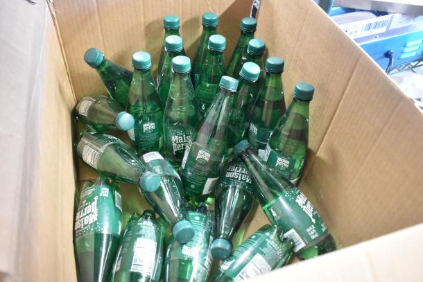 Box of green Maison Perrier bottles, unopened. Potential auction item with Avalon filter, cup dispenser, Sony roll.