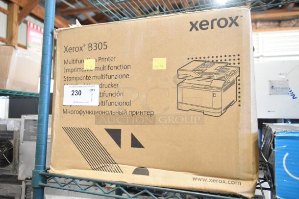 Boxed Xerox B305 Multifunction Printer, brand new with scratches and dents. Labels show model and original price $299.99.