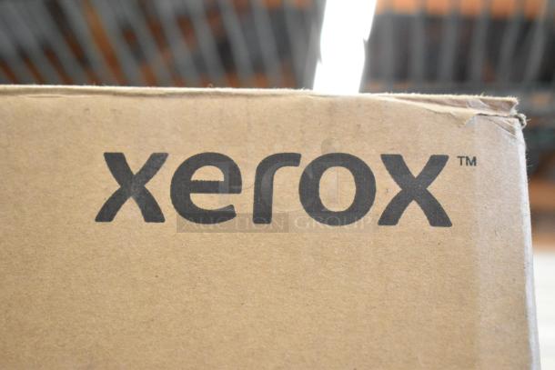 Brown box with Xerox logo, containing a brand new scratch and dent Xerox B305 Multifunction Printer.