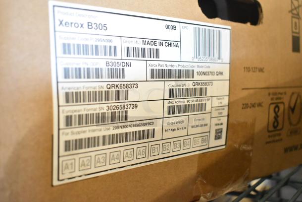 BRAND NEW SCRATCH AND DENT Xerox B305 Multifunction Printer box with model and serial numbers visible on label.