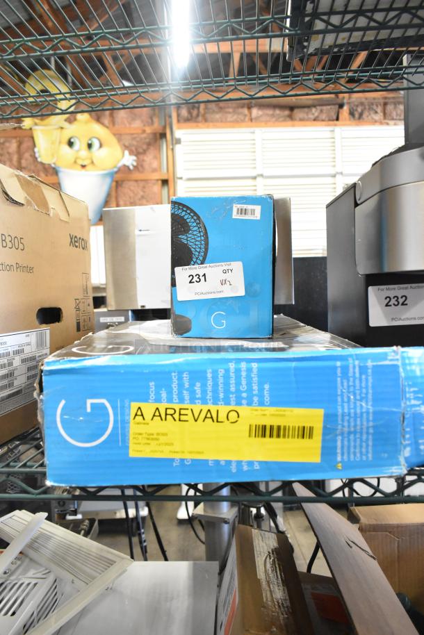 Brand new Genesis Twin Fan and Genesis 6-Inch Clip Fan. Boxes show minor dents. Tags indicate 2 times your bid, lot 231.