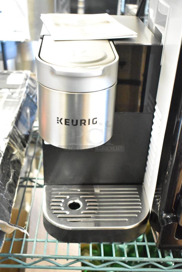 Keurig K-2550 Single Cup Coffee Machine, sleek black and silver design, excellent condition, 115 Volts, 1 Phase.