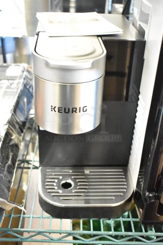 Keurig K-2550 Single Cup Coffee Machine, sleek black and silver design, excellent condition, 115 Volts, 1 Phase.