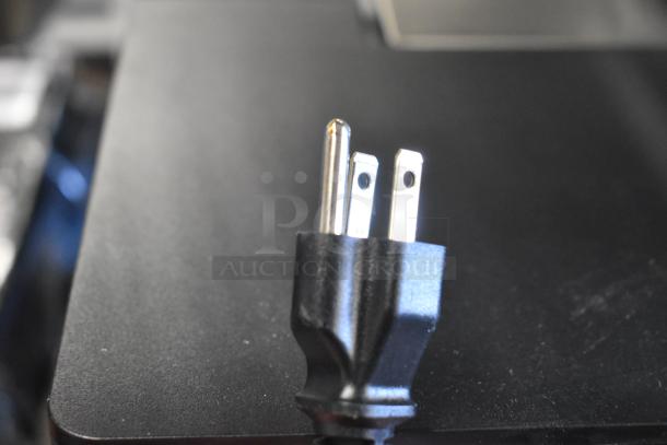 Close-up of a power plug for Keurig K-2550 Single Cup Coffee Machine, 115 Volts, 1 Phase.