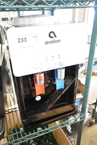 Brand new Avalon A1CTWTRCLRWHT countertop water cooler dispenser, hot/cold features, 115 volts, scratch and dent condition.
