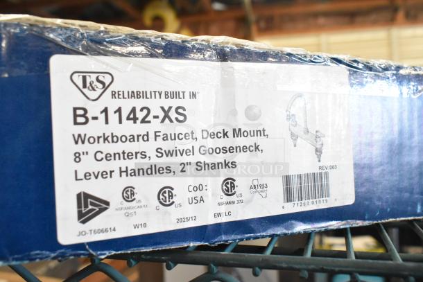 BRAND NEW T&S B-1142-XS deck mount faucet, 8" centers, 5 3/4" gooseneck, escutcheon, tailpieces, minor scratches.