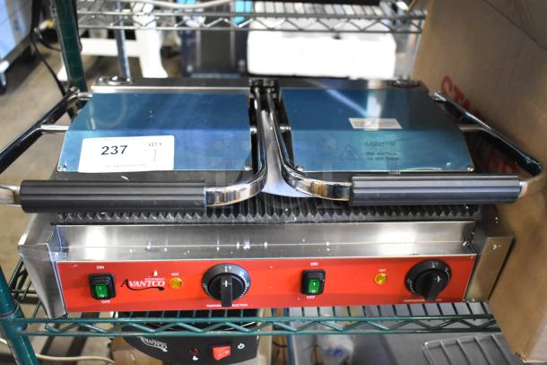 Brand new 2025 Avantco 177PG400 dual panini grill, grooved plates, 19 5/8" x 9 1/8" surface, 120V, minor scratches.