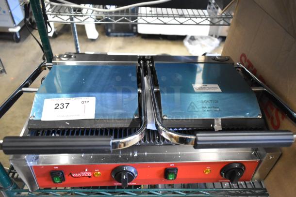 Brand new 2025 Avantco 177PG400 dual panini grill, grooved plates, 19 5/8" x 9 1/8" surface, 120V, minor scratches.