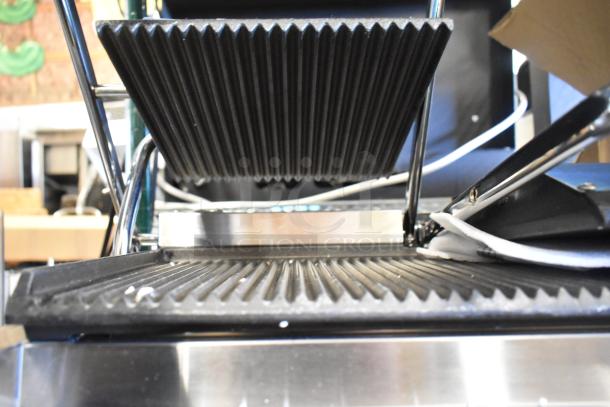BRAND NEW 2025 Avantco 177PG400 Commercial Dual Panini Grill, grooved plates, 19 5/8" x 9 1/8" surface, 120V, 1 phase.