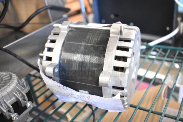 Brand new Avantco condenser fan motor with label indicating model SL512MTR, shown on a metal shelf.