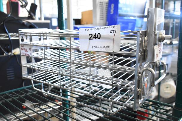 "Brand new wire basket with slight scratches, item 112140486. Features sturdy metal construction. Auction tag visible."