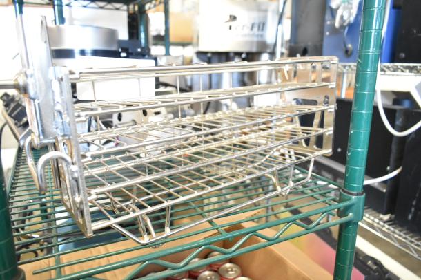 "Brand new scratch and dent metal basket, model 112140486, with a sturdy wire design on a storage rack."