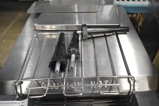 Brand new Galaxy 177GCT10 conveyor toaster with 3" opening, 120V, 1 phase. Visible metal rack and "Caution Hot" marking.