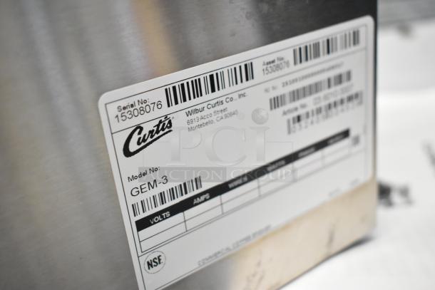 "Brand new Curtis ALP1GT12A000 coffee brewer, 12-cup capacity, scratch and dent, 120V, 1 phase, label showing model GEM-3."