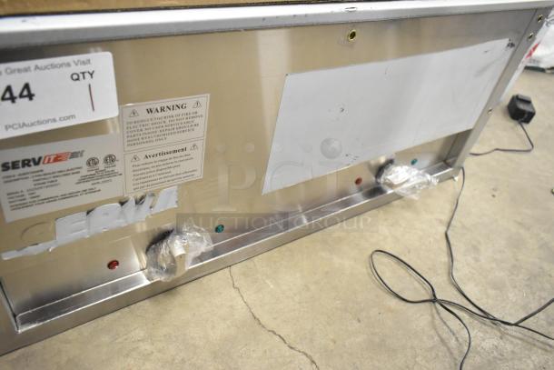 Brand new scratch and dent 2025 ServIt 423EST2WSPB electric steam table, two pan capacity, 120 volts, partially enclosed base.