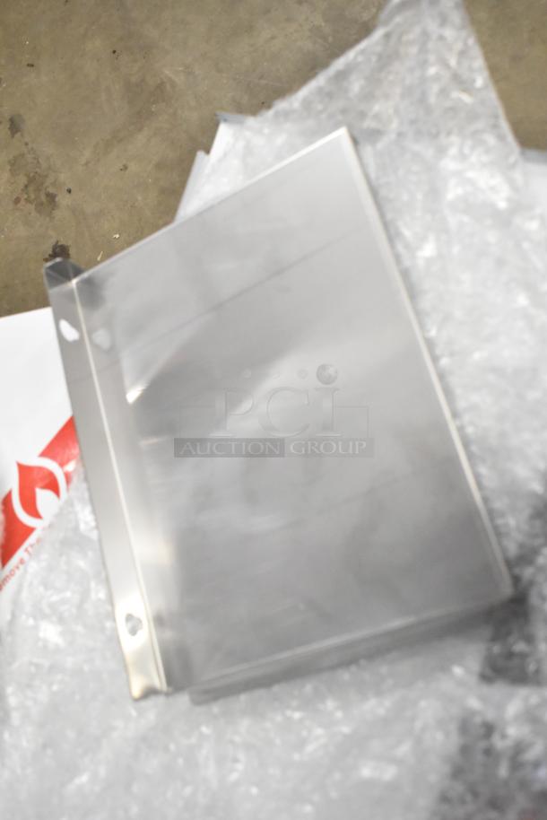 Metal part wrapped in bubble wrap, likely a component of the Galaxy 177GCT10 Conveyor Toaster. Appears brand new.