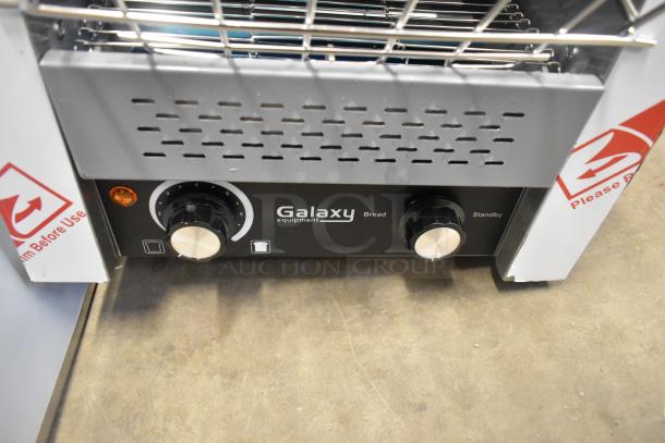 Brand new Galaxy 177GCT10 conveyor toaster, 3" opening, 120V, 1 phase. Control knobs and labels visible, minor scratch.