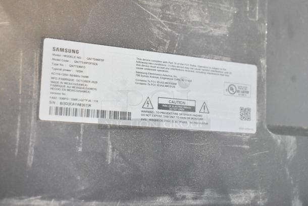 Label on Samsung QN77S90FDF TV showing model number, power details, and manufacturing date, October 2025.