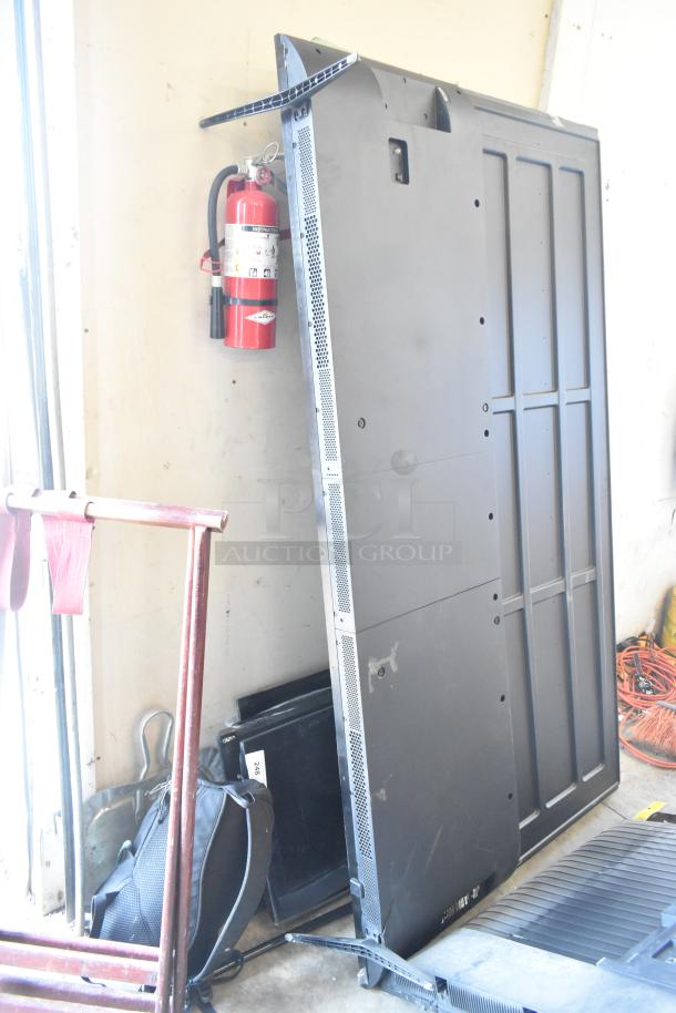 Four televisions for auction, including Samsung QN77S90FDF 77", Samsung UN75U7900FD 75", and Vizio models. Buyer pickup only.